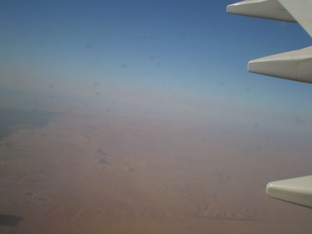 Boeing 737-700 (SU-BPH) - Flight fron HRG tu CAIbr /Note the Pyramides on the Ground