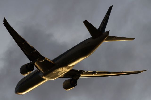 Boeing 777-200 — - Departing runway 027R, LHR.