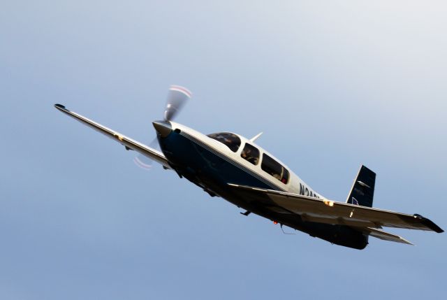 Mooney M-20 (N242MD) - Taken By Judy C. departing Runway 16.