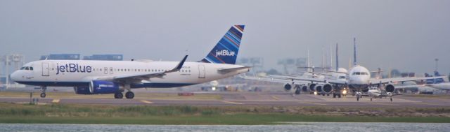 Airbus A320 (N805JB) - Logan Airports evening departure rush!