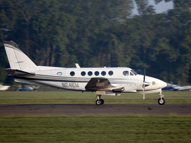 Beechcraft King Air 100 (N24EM) - CFMs (Corporate Flight Management) King Air 100 taking off runway 08 at Danbury CT. CFM (Corporate Flight Management) has 3 x King Air 100, 2 x Phenom 100 and 2 x Citation V available for charter in the New York metropolitan area KDXR KHPN KTEB KBDR  a rel=nofollow href=www.FLYCFM.COMwww.FLYCFM.COM/a