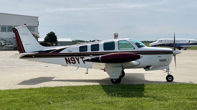 Beechcraft Bonanza (36) (N9YT) - N9YT, a 1997 Beech A36 Bonanza, sitting out on the FBO. 5/28/22. 