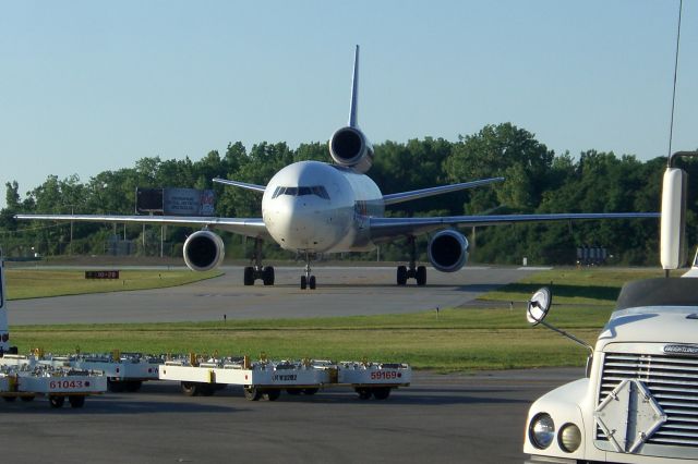 McDonnell Douglas DC-10 (N554FE) - N554FE, a FedEx MD-10-10F, pulling up to the ramp, fresh in from Memphis, on a warm August 2012 afternoon.