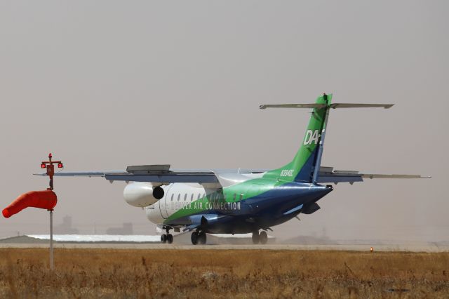 Fairchild Dornier 328JET (N394DC) - A Denver Air Connection (Key Lime Air), 328Jet, LYM5412, touching down at Clovis Municipal Airport on 14 Nov 2020. The wind sock and dusty scenes should give you an idea of how windy it was today. 