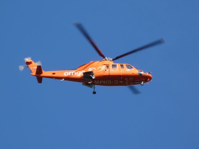 Sikorsky S-76 (C-GIMW) - air ambulance over flying ottawa approach.