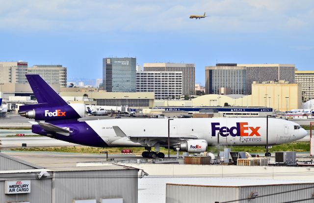 Boeing MD-11 (N572FE) - N572FE FedEx Express McDonnell Douglas MD-11F (cn 48769/603)  Los Angeles International Airport (IATA: LAX, ICAO: KLAX, FAA LID: LAX) TDelCoro April 11, 2012