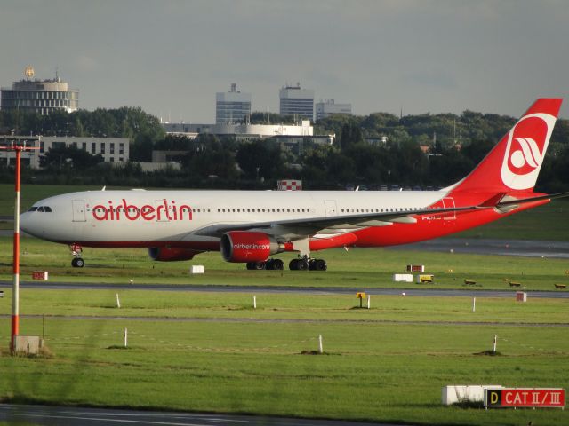 Airbus A330-200 (D-ALPA) - An Air Berlin A330-MSN 403 is standing in the Hamburg evening sun.