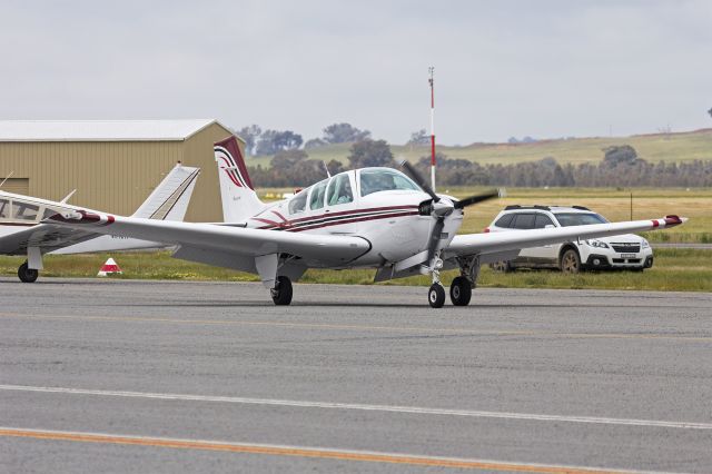 Beechcraft Bonanza (33) (VH-SIQ) - Beechcraft F33A Bonanza (VH-SIQ) taxiing at Wagga Wagga Airport.