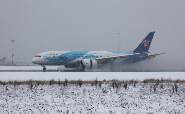 Boeing 787-8 (B-2737) - It was snowing quite heavily at the time