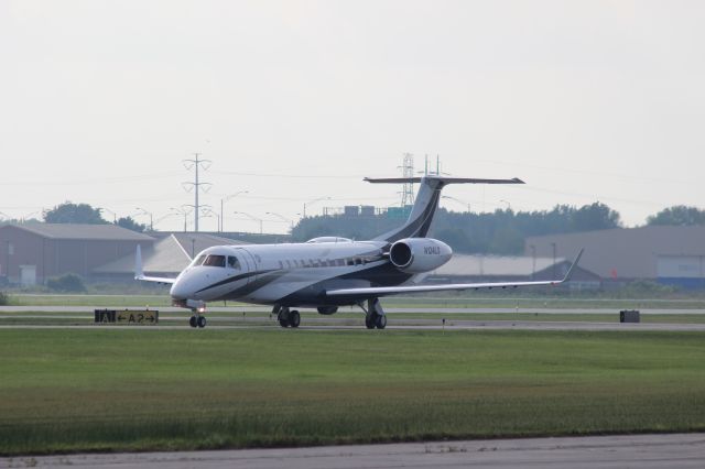 Embraer Legacy 600/650 (N124LS) - Coming in on Taxiway "Alpha" to the F.B.O. at Gary Regional Airport.