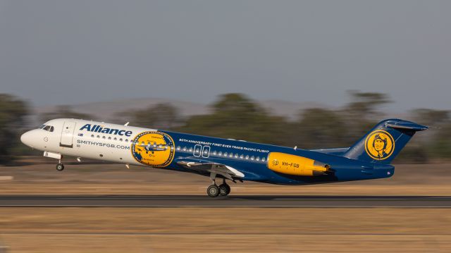 Fokker 100 (VH-FGB) - Commemorative livery.  1/60th sec. Departing YBRK.