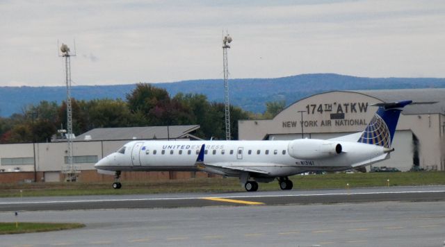 Embraer EMB-145XR (N13161) - Departing the active runway is this 2004 United Air Express 145XR in the Autumn of 2020.