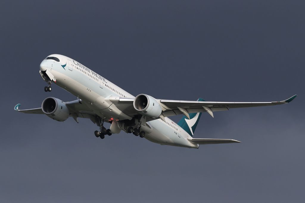 Airbus A350-900 (B-LRA) - The winter timetable sees a flight number change from CPA358 to CPA216.  B-LRA cleaning up against a background of dark skies on the flight back to Hong Kong