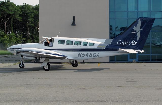 Cessna 402 (N548GA) - With the "air condition" running.