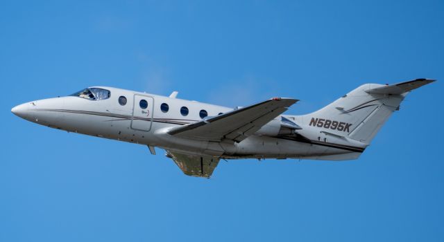 Beechcraft Beechjet (N5895K) - Departing runway 23