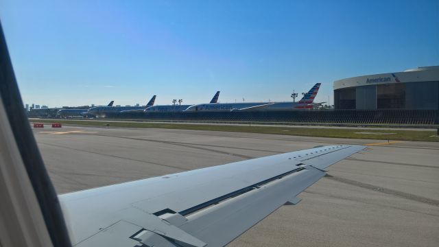 — — - Taking off  Miami international  to Pittsburg international airport 