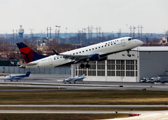 Embraer 170/175 (N617CZ) - Photographed from the 7th floor parking garage at Midway Airport