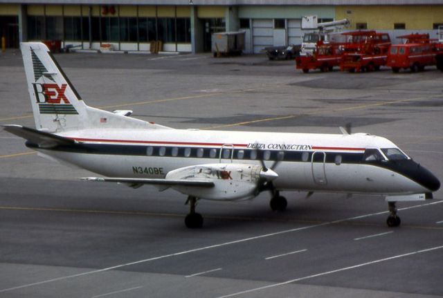 Saab 340 (N340BE) - N340BE taxi out of the BEX allyway - early 90's