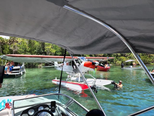 Piper L-21 Super Cub (N1907A) - Rafting up with boats at Silver Glen Springs, Lake George 