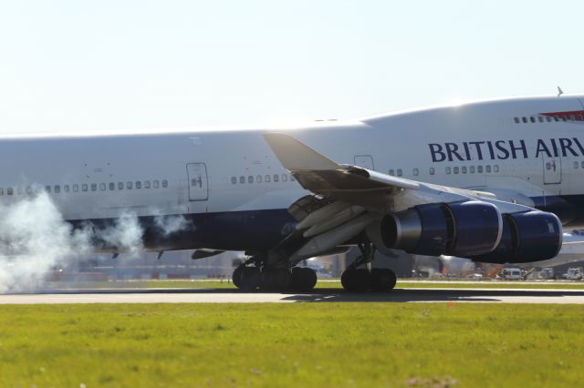 Boeing 747-400 (G-BNLK) - Touch down on runway 027R, LHR.