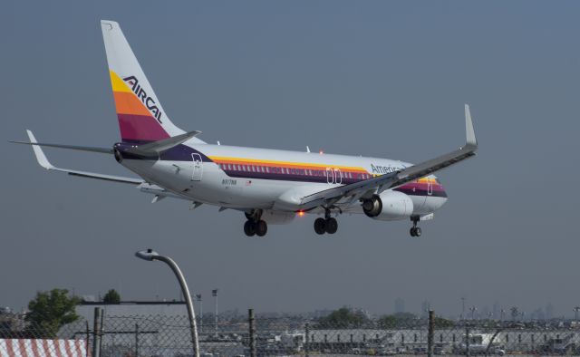 Boeing 737-800 (N917NN) - Taken at Planeview Park on a nice sunny day. Air Cal retro livery