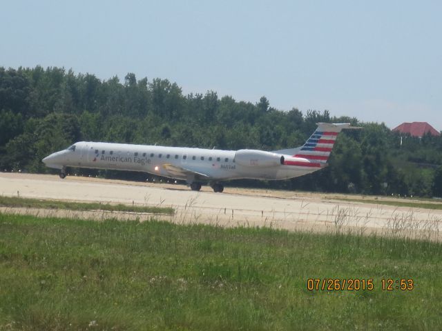 Embraer ERJ-145 (N607AE) - Taken: Public Viewing area @ KORFbr /Camera: Canon PowerShot ELPH 110 HS