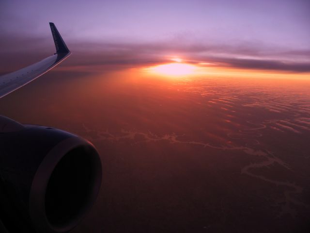 Boeing 737-700 (N299AT) - Heading north from ATL to PIT on flt 990 with a beautiful sunset to the west