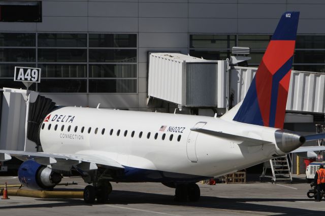 Embraer 175 (N602CZ) - March 27, 2011 - at the gate in Detroit 