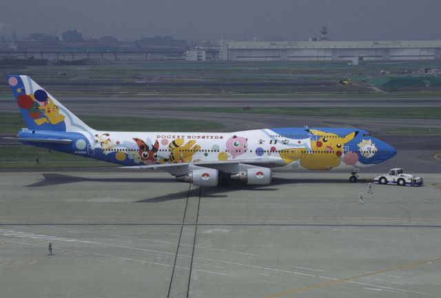Boeing 747-400 (domestic, no winglets) (JA8964) - Push Back at Tokyo-Haneda Intl Airport on 1999/06/21 " Pokemon c/s "
