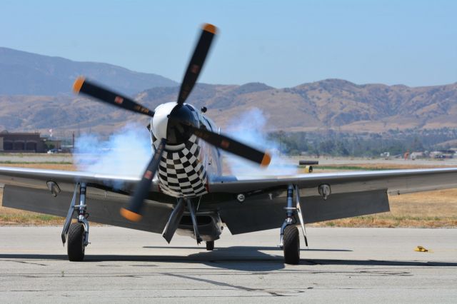 — — - 51 Cranking on the flight line, chino Plane of Fame Airshow