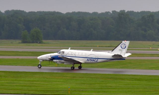 Beechcraft Airliner (N799CZ) - Freight Runners Express Beech 99 N799CZ in Lansing 