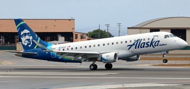 Embraer 175 (N176SY) - The mains are down and rolling as SkyWests N176SY, an Embraer E75L, lands on runway 10R to complete a flight from San Diego (KSAN).br /The angle of this shot coincides almost exactly with a photo posted by FA member Tom Vance. The picture posted by Tom was taken in 1988 ... thirty years ago. The same structures are in both pictures, and they are virtually unchanged over the 30 year time frame. There are really only two major differences between this photo and Toms: 1) the aircraft are different and 2) there are trees in my photo that werent there 30 years ago.br /Follow this link to view Toms picture ...br /a rel=nofollow href=http://flightaware.com/photos/view/286780-a24699c0483262734c0b672ebb47b45264fe6666/airport/KMRY/sort/date/page/1https://flightaware.com/photos/view/286780-a24699c0483262734c0b672ebb47b45264fe6666/airport/KMRY/sort/date/page/1/a