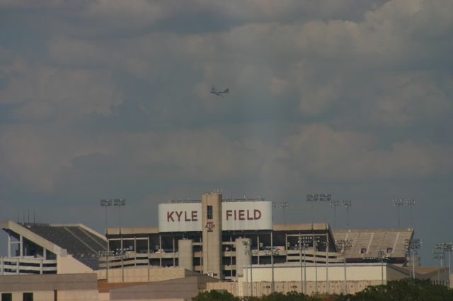 Boeing B-29 Superfortress (N529B) - FiFi flys over Kyle Field in the center of Texas A&M University.