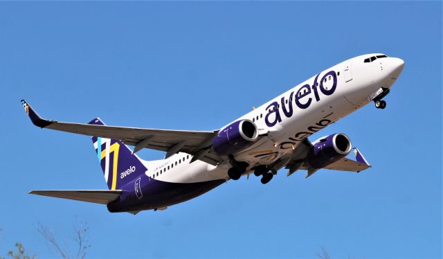 Boeing 737-800 (N803XT) - RDD - June 12 2021 I finally caught a Runway 16 departure in full sun at 330pm - new Airline AVELO serving Redding to Burbank ( KRDD-KBUR) every 3 days. This flight about 90% full and had to wait at the hold bars while 2 USMC helicopters approached and flew the Runway 16 heading all the way to the end for a right hover, and low hover back towards the Tower and landing pad.