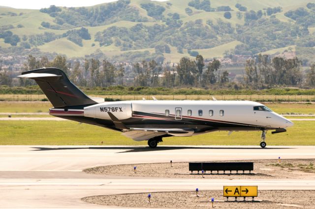 Bombardier Challenger 300 (N576FX) - Bombardier BD-100-1A10 Challenger 300 departs Livermore Municipal Airport, March 2022.