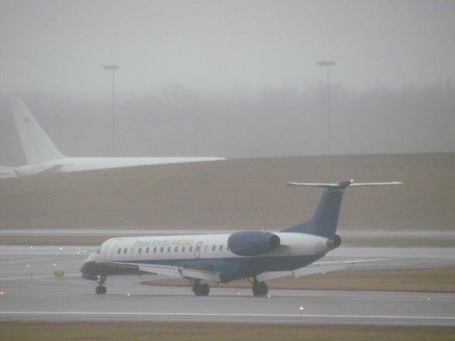 Embraer ERJ-145 (N812HK) - Trans State E145 rolling down the runway at CVG