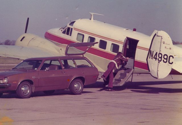 Beechcraft 18 (N499C) - Loading up and headed out for vacation in the early 1970's.