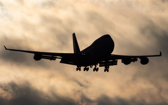 Boeing 747-400 (N322SG) - Backlit 747 in the sunset!