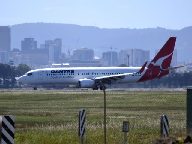 Boeing 737-800 (VH-VYE) - On taxi-way heading for Terminal 1, after landing on runway 23.