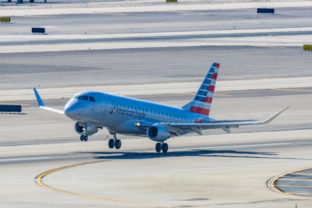 Embraer 175 (N247NN) - An American Eagle ERJ175 taking off from PHX on 2/11/23 during the Super Bowl rush. Taken with a Canon R7 and Canon EF 100-400 II L lens.