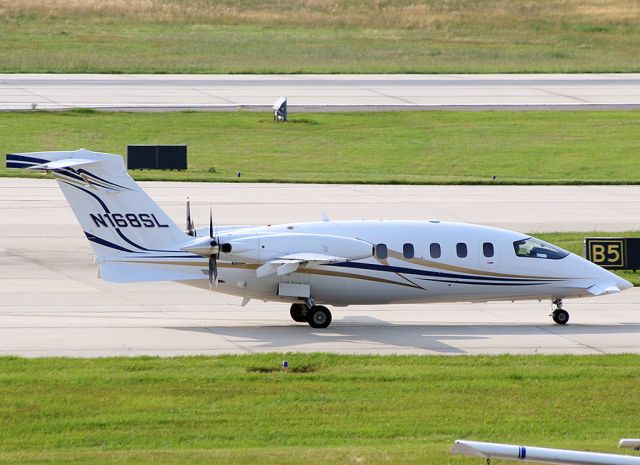 Piaggio P.180 Avanti (N168SL) - Taxiing to RWY 23R.