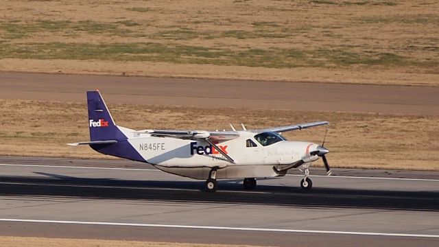 Cessna Caravan (N845FE) - Takeoff roll down 18C.