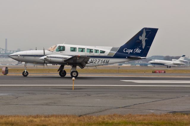 Cessna 402 (N2714M) - landing and departing 22L and 22R @ KBOS Logan !