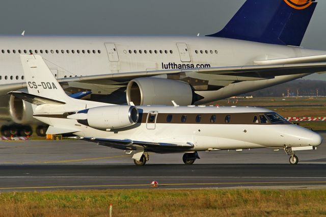 Cessna Citation Excel/XLS (CS-DQA) - photo taken 20-Mar-2014, line-up RWY18, while a Lufthansa A380 is being towed in the backdrop, late afternoon light