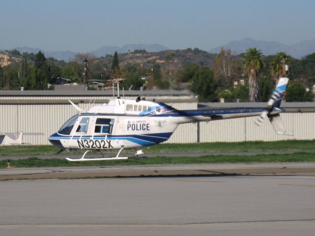 N3202X — - LAPD chopper lifting off from Fullerton