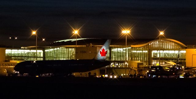 — — - Toronto Terminal 1 at night.