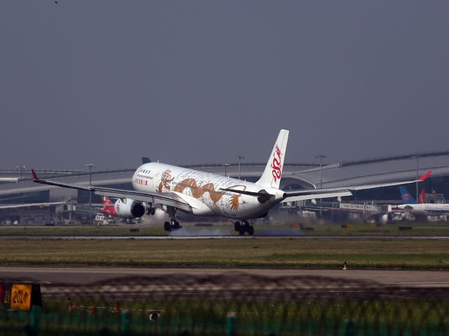 Airbus A330-300 (B-HYF) - Dragonair special 25th Anniversary Livery.