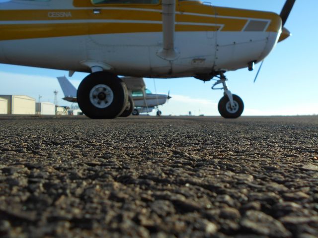 Cessna 152 (N49878) - N49878 and its twin N89934 on the ramp