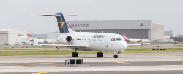 Fokker 70 (VH-JFB) - Taxiing to runway 19R.