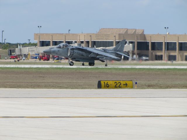 — — - Black Sheep Squadron Harriers coming in behind P-51. They are in town for the football game this weekend.